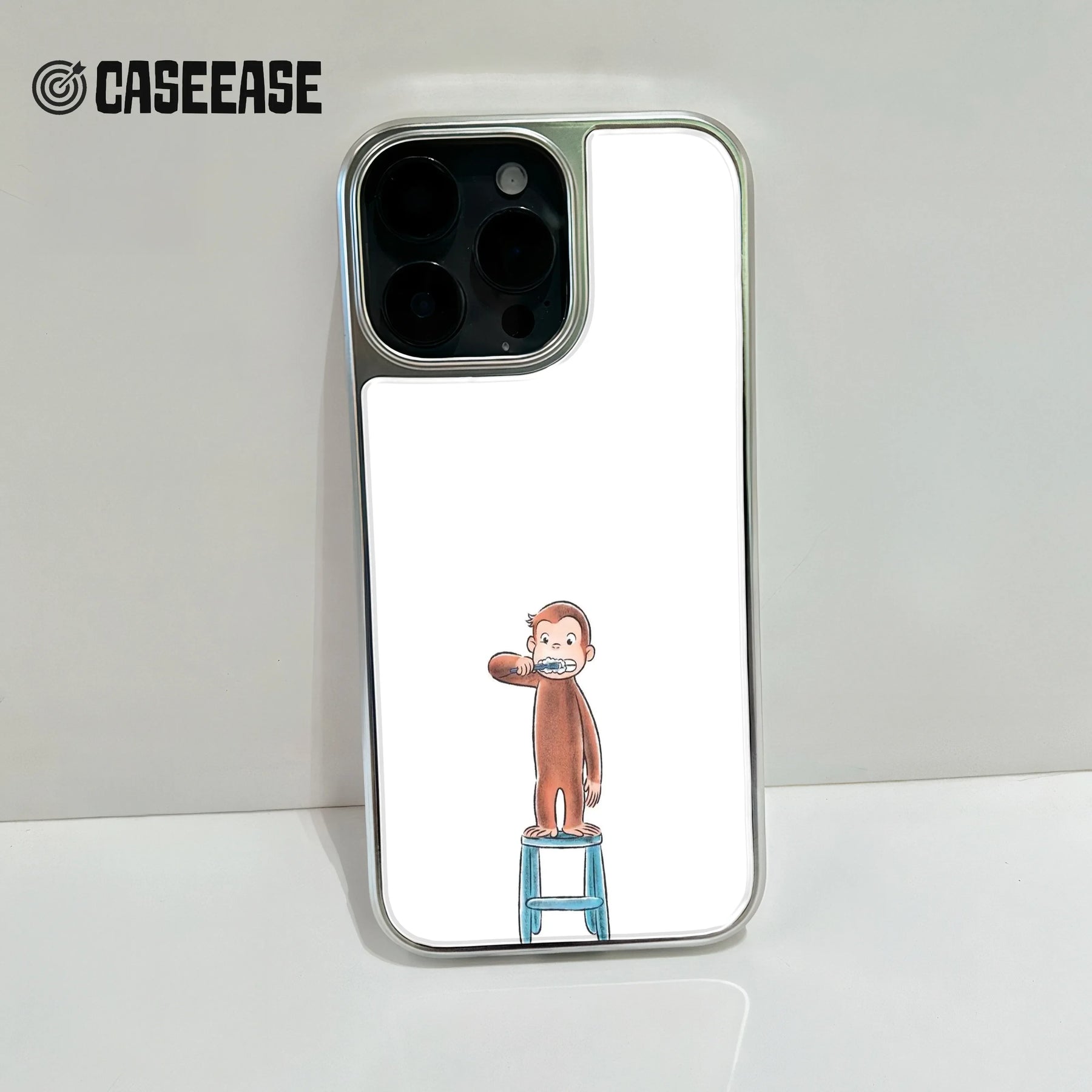 Funda para teléfono con George el curioso cepillándose los dientes