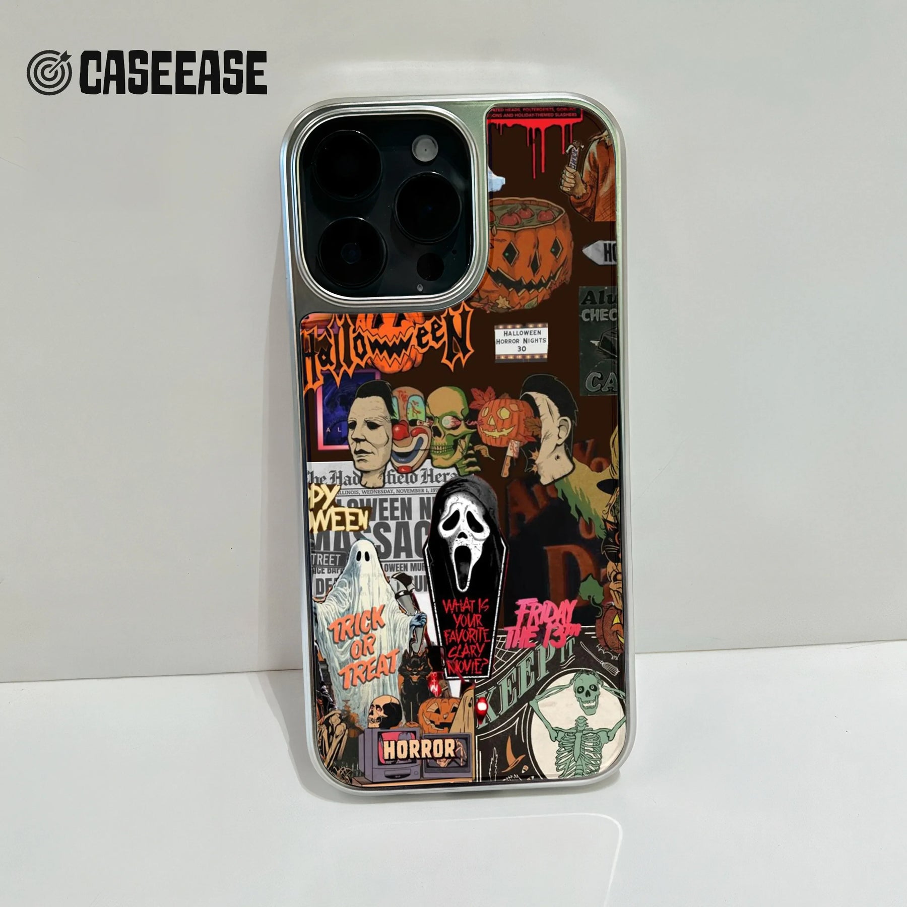Silver phone case with Halloween horror collage, close-up back camera angle for storefront