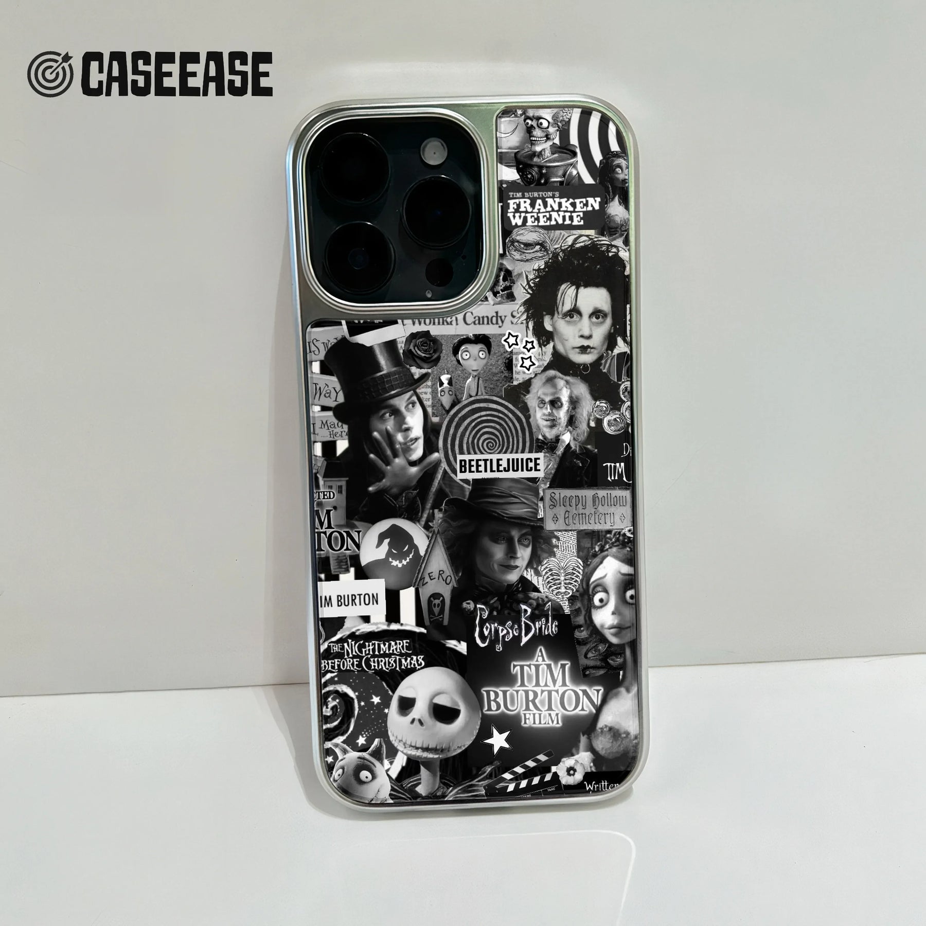 Silver phone case with black and white film collage, rear angle on smartphone