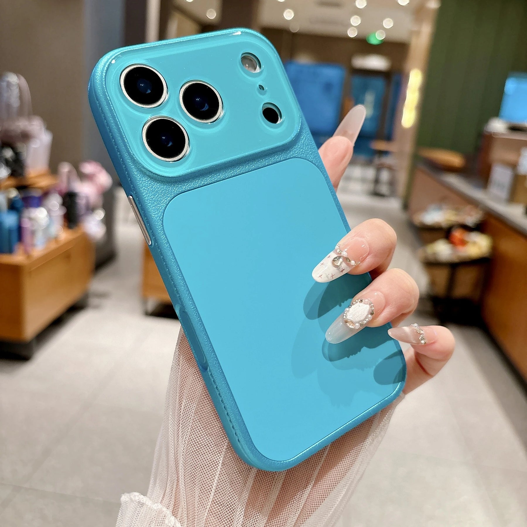Aqua blue faux leather color block iPhone case lifestyle photo
