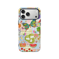 Colorful patchwork phone case rear view with butterfly, picnic, and garden illustrations