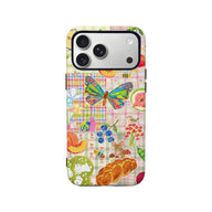 Colorful patchwork phone case with butterfly and garden illustrations, rear product view