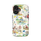 Cream phone case with colorful storybook monkey illustrations, rear product angle