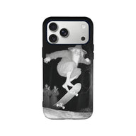 Black phone case with grayscale skateboarding wizard design, rear product view