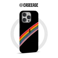 Black CASEEASE iPhone case with diagonal rainbow surfer design, shown from rear angle