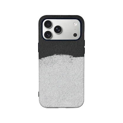 Black and white textured plastic phone case, rear view with camera cutout