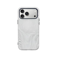 White wavy patterned phone case shown from back with triple camera cutout