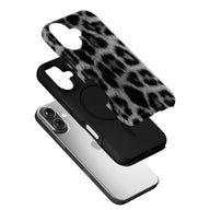 Black and gray leopard print phone case shown angled above silver smartphone