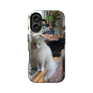 Glossy plastic phone case with white and black cats, full-back print, rear angle