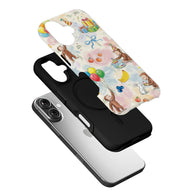 Pastel monkey party print phone case with black inner layer, angled exploded product view