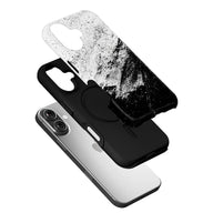 Black and white speckled phone case layers shown angled above smartphone