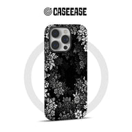 Black phone case with white floral pattern, rear angle for CASEEASE product page