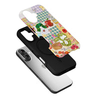 Angled exploded black phone case with colorful patchwork cartoon insert for smartphone